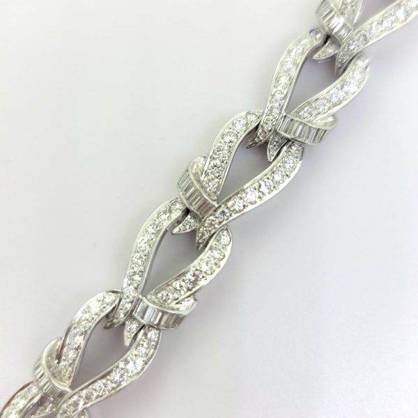 7.20ct Brilliant and Baguette Diamond Set Platinum Link Bracelet, platinum link bracelet set with 7.20 carats of brilliant and baguette cut diamonds with hidden clasp and safety catch
