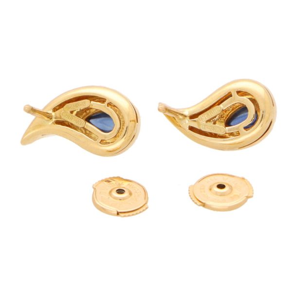 Sapphire stud earrings in yellow gold.