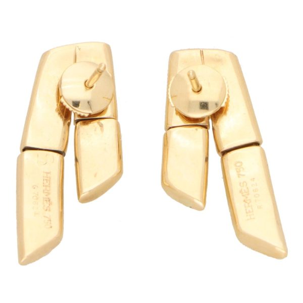 Vintage Hermes gold earrings.