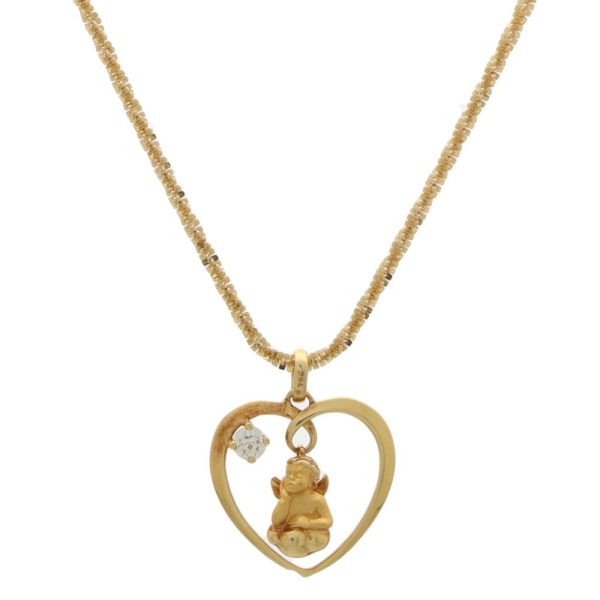 Diamond cherub and heart pendant in yellow gold.