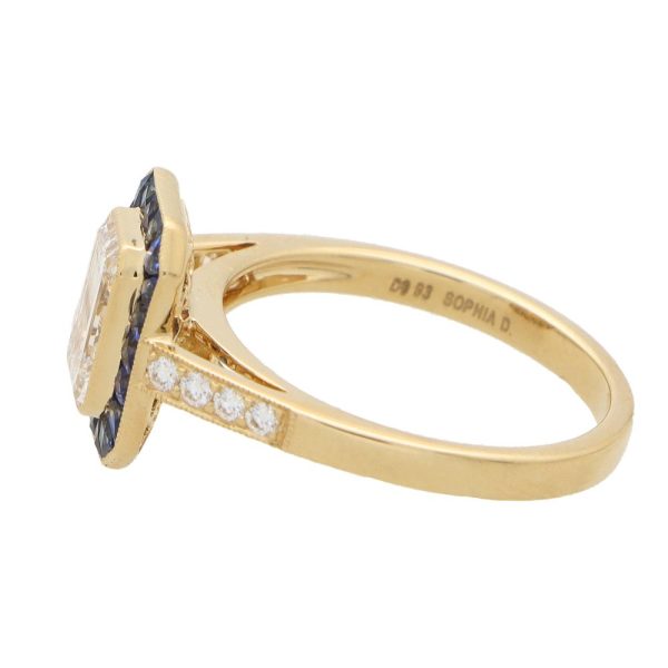 Diamond and sapphire target ring in gold.