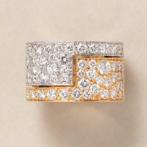 A vintage 18ct yellow and white gold diamond band ring