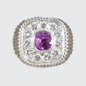 Signet ring with pink sapphire and diamonds in platinum. 