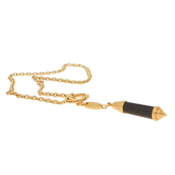 Chaumet necklace in yellow gold with snakewood pendant.