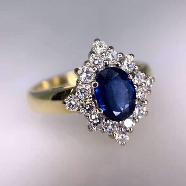 Vintage 18ct yellow gold marquise cut sapphire and diamond cluster ring