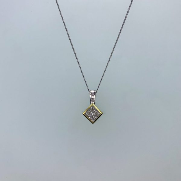 Contemporary 18ct yellow and white gold diamond pave pendant