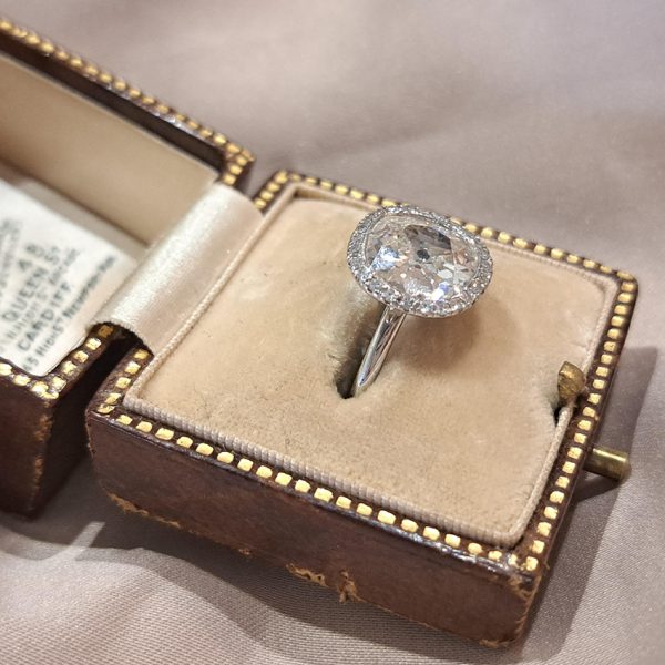 Vintage 3.15ct Cushion Old Cut Diamond Halo Cluster Engagement Ring in Platinum