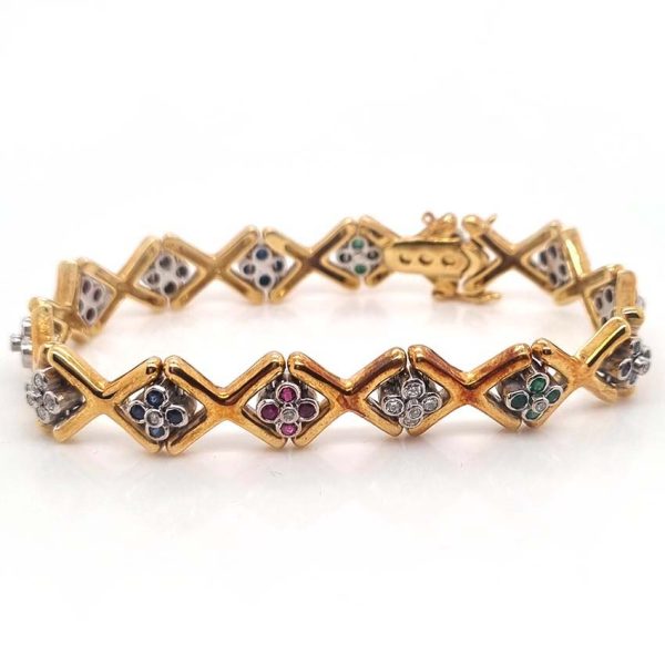 Ruby Emerald Sapphire Diamond Set Gold Bracelet, 18ct yellow gold 'X' design link bracelet accented with clusters of rubies, emerald, sapphires and diamonds