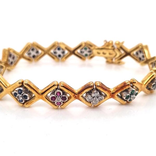 Ruby Emerald Sapphire Diamond Set Gold Bracelet, 18ct yellow gold 'X' design link bracelet accented with clusters of rubies, emerald, sapphires and diamonds