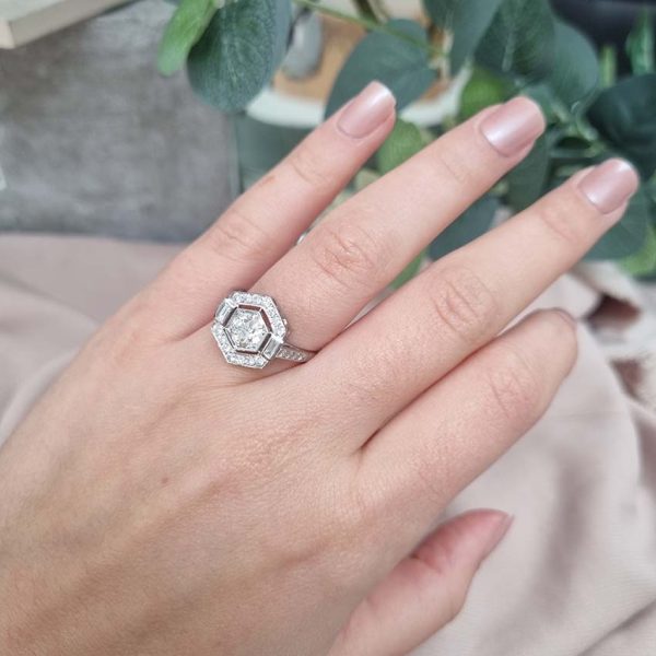 Hexagonal Diamond Cluster Engagement Ring in Platinum, 1.15 carats, 0.75ct diamond surrounded by fixed border of brilliant-cut diamonds with baguette-cut diamonds to each side