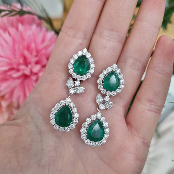 9.24ct Pear Cut Emerald and Diamond Double Cluster Drop Earrings, pear cut emerald and diamond cluster tops suspend pear cut emerald and diamond cluster drop pendants via diamond leaf links in 18ct white gold
