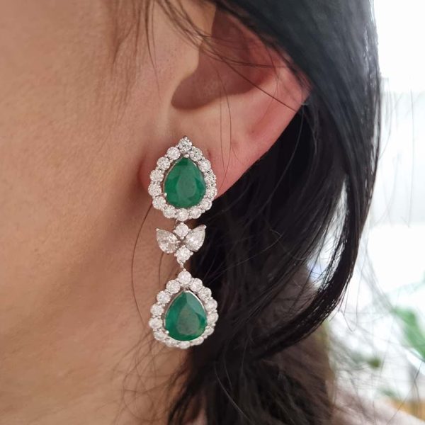 9.24ct Pear Cut Emerald and Diamond Double Cluster Drop Earrings, pear cut emerald and diamond cluster tops suspend pear cut emerald and diamond cluster drop pendants via diamond leaf links in 18ct white gold