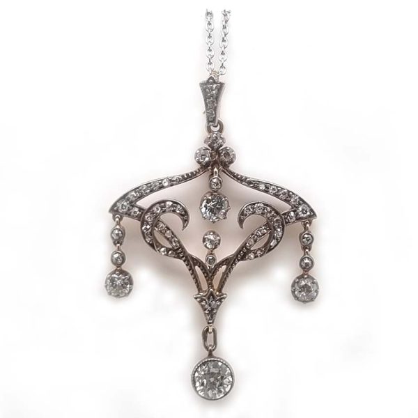 Antique Art Nouveau 1.50ct Old Cut Diamond Pendant, iconic fluid design set with 1.50 carats of old-cut diamonds with articulated drops in silver to 18ct gold