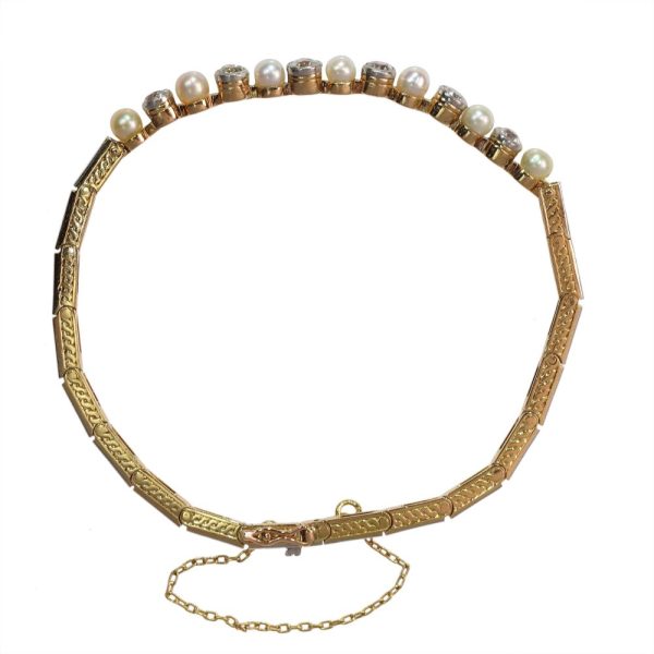 Art Deco diamond and pearl bracelet in white and yellow gold.