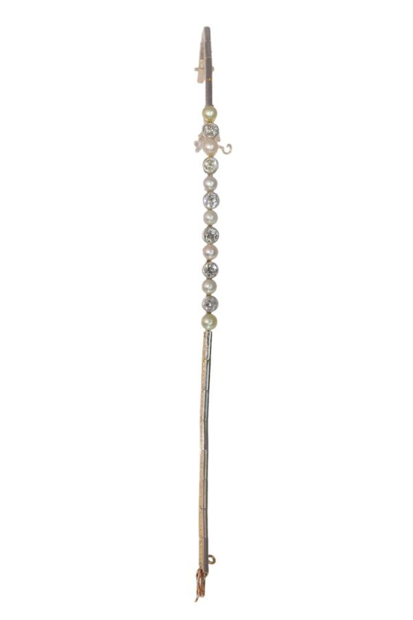 Art Deco diamond and pearl bracelet in white and yellow gold.