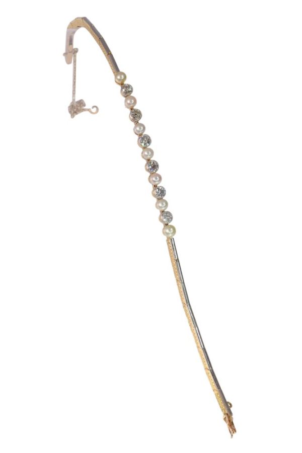 Art Deco diamond and pearl bracelet in white and yellow gold.