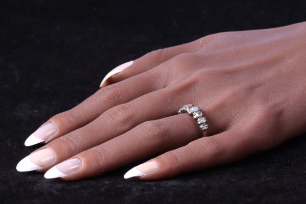 Antique Baroque diamond ring in gold and silver.