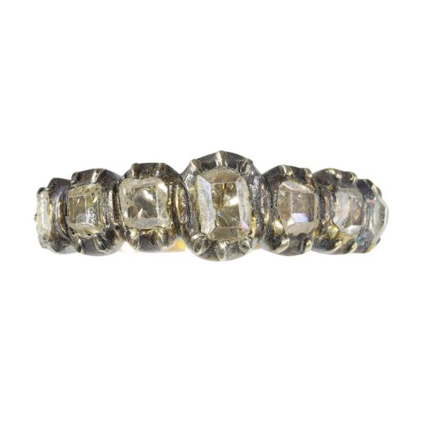 Antique Baroque diamond ring in gold and silver.