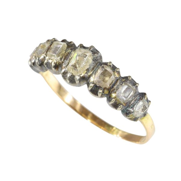 Antique Baroque diamond ring in gold and silver.
