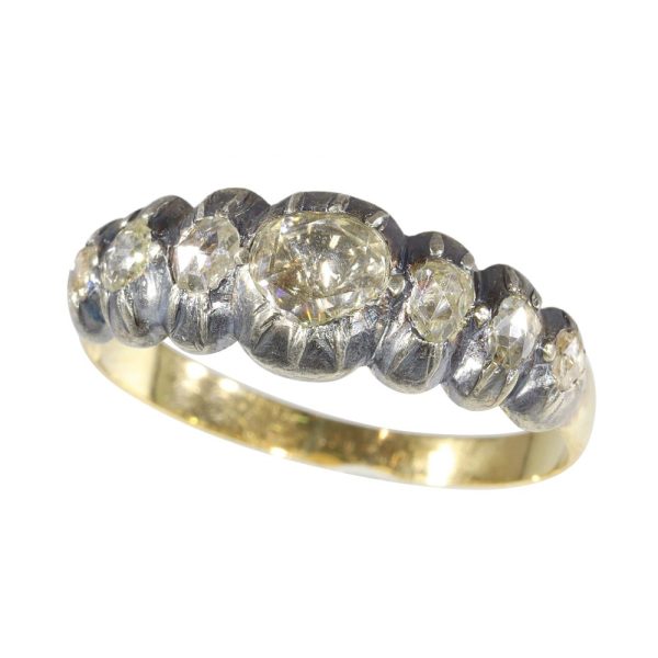 Victorian diamond ring in yellow gold and silver.