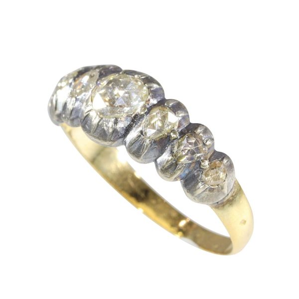 Victorian diamond ring in yellow gold and silver.