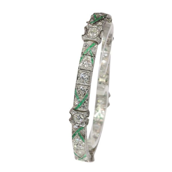 Art Deco platinum bracelet with diamonds and emeralds.
