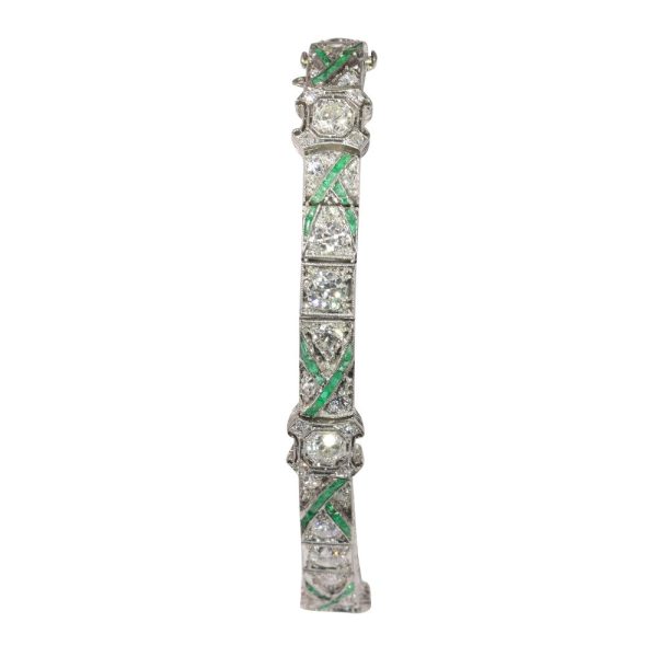 Art Deco platinum bracelet with diamonds and emeralds.