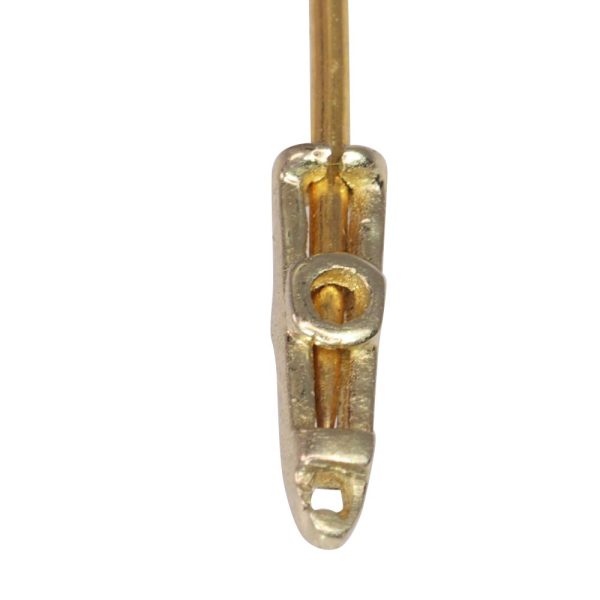Vintage flying bird tiepin with multiple gemstones in gold.
