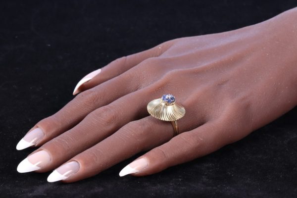 Vintage gold ring set with diamond and sapphires.