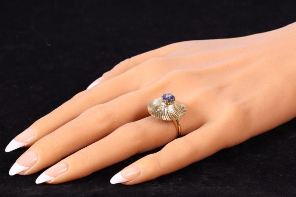 Vintage gold ring set with diamond and sapphires.