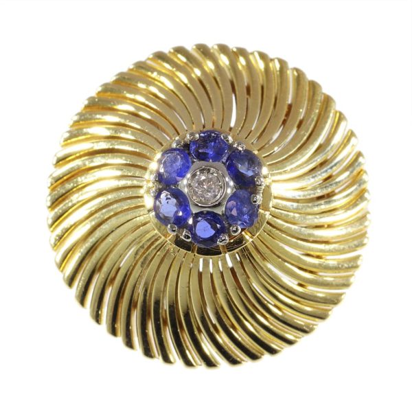 Vintage gold ring set with diamond and sapphires.