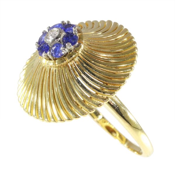 Vintage gold ring set with diamond and sapphires.