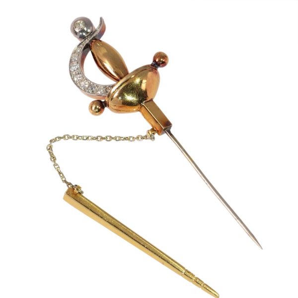 Vintage diamond sword brooch in yellow gold.
