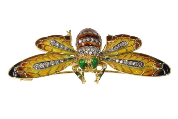 Vintage diamond bee brooch/pendant in gold.