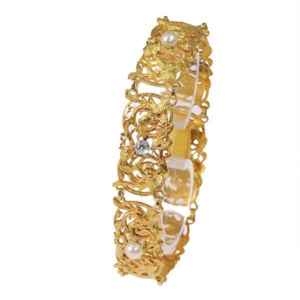 Victorian gold bracelet with pearls and old cut diamonds.