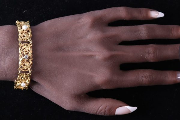 Victorian gold bracelet with pearls and old cut diamonds.