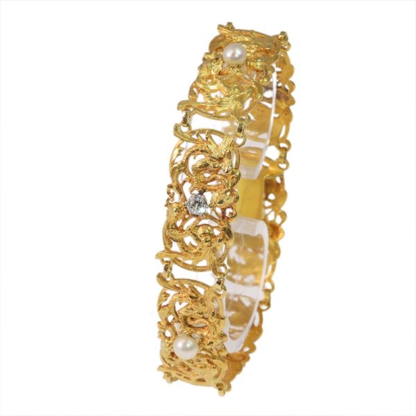 Victorian gold bracelet with pearls and old cut diamonds.