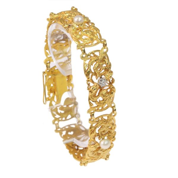 Victorian gold bracelet with pearls and old cut diamonds.