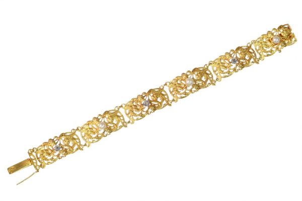 Victorian gold bracelet with pearls and old cut diamonds.