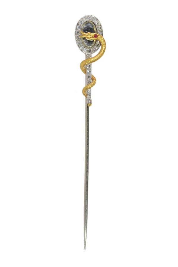 Vintage diamond and ruby stickpin in gold.