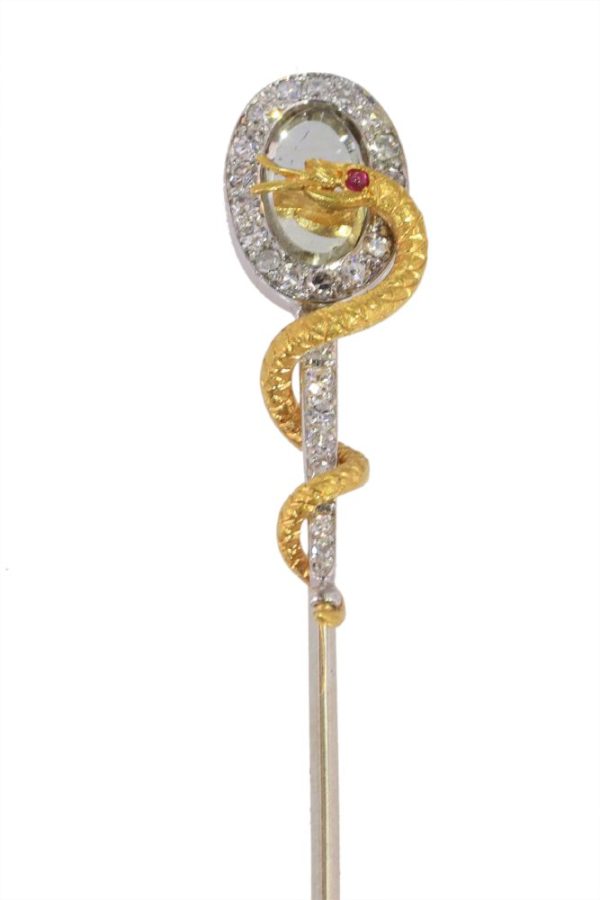 Vintage diamond and ruby stickpin in gold.