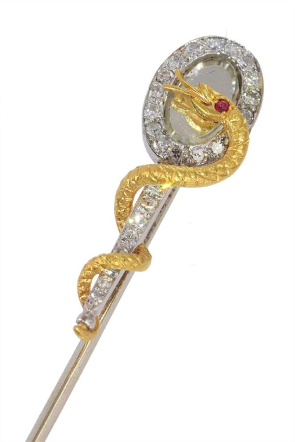 Vintage diamond and ruby stickpin in gold.