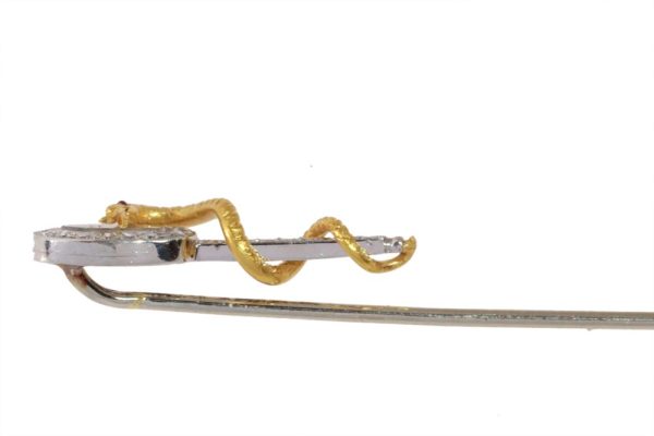 Vintage diamond and ruby stickpin in gold.