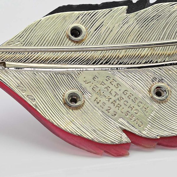 Art Deco Paltscho Vienna Red Chalcedony Black Onyx and Diamond Feather Brooch, carved red chalcedony and black onyx feather with diamond dots and rose-cut diamonds along the stem in 14ct white gold. Circa 1920. With Austro Hungarian marks of the period - Signed Ges. Gesh. (copyright) E. PALTSCHO – WIEN – KARLSBAD N. 29