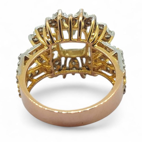 Aquamarine and diamond cluster dress ring in 21 carat yellow gold