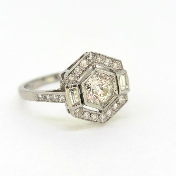 Hexagonal Diamond Cluster Engagement Ring in Platinum, 1.15 carats, 0.75ct diamond surrounded by fixed border of brilliant-cut diamonds with baguette-cut diamonds to each side