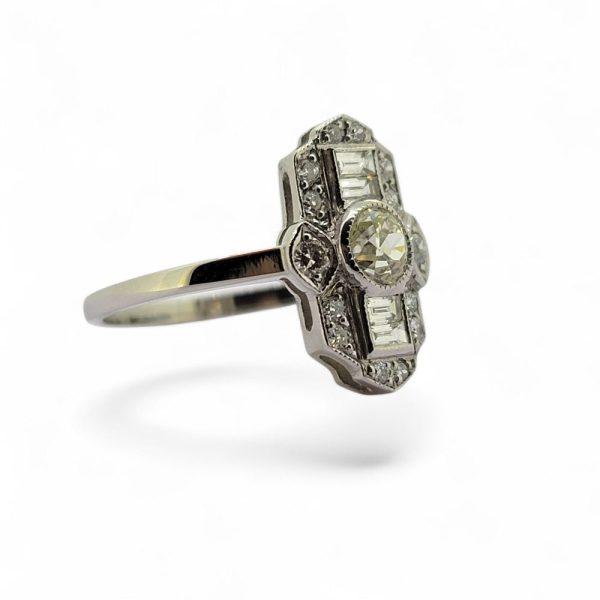 Art Deco Diamond Cluster Tablet Plaque Ring in Platinum, old-cut diamond set central to a line of baguette diamonds all within sparkling diamond surround