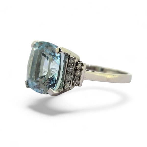 Cushion Cut Aquamarine and Diamond Ring in Platinum, cushion shaped aquamarine flanked by diamond-set stepped shoulders