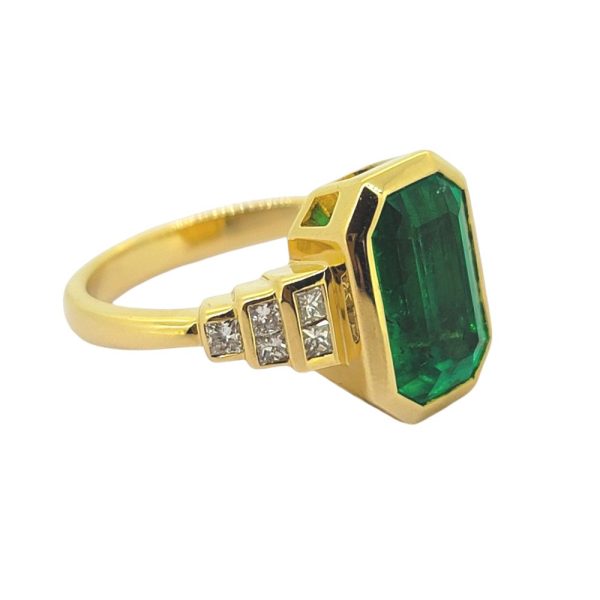 3ct Colombian Emerald and Diamond Ring in Yellow Gold, 3.13ct emerald-cut Colombian with princess-cut diamond stepped shoulders in 18ct yellow gold
