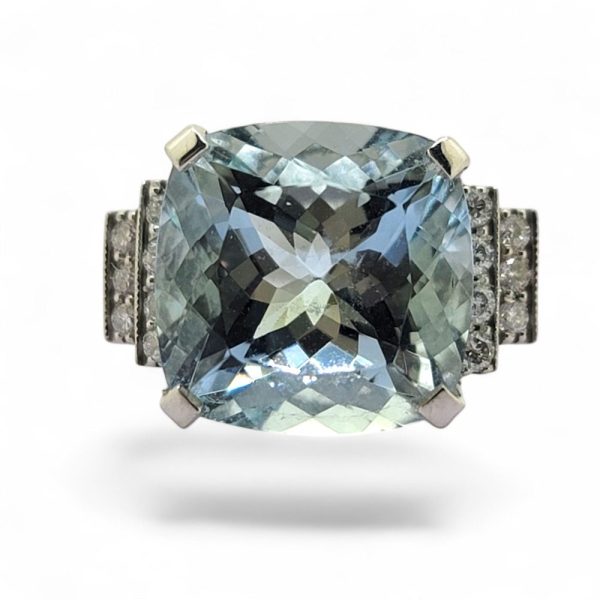 Cushion Cut Aquamarine and Diamond Ring in Platinum, cushion shaped aquamarine flanked by diamond-set stepped shoulders